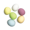 Set of six pastel-colored makeup sponges on a white background