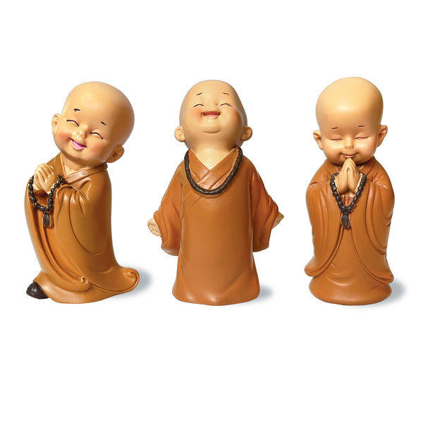 Close-up of handmade polyresin monk figurine with detailed hand-painted finish