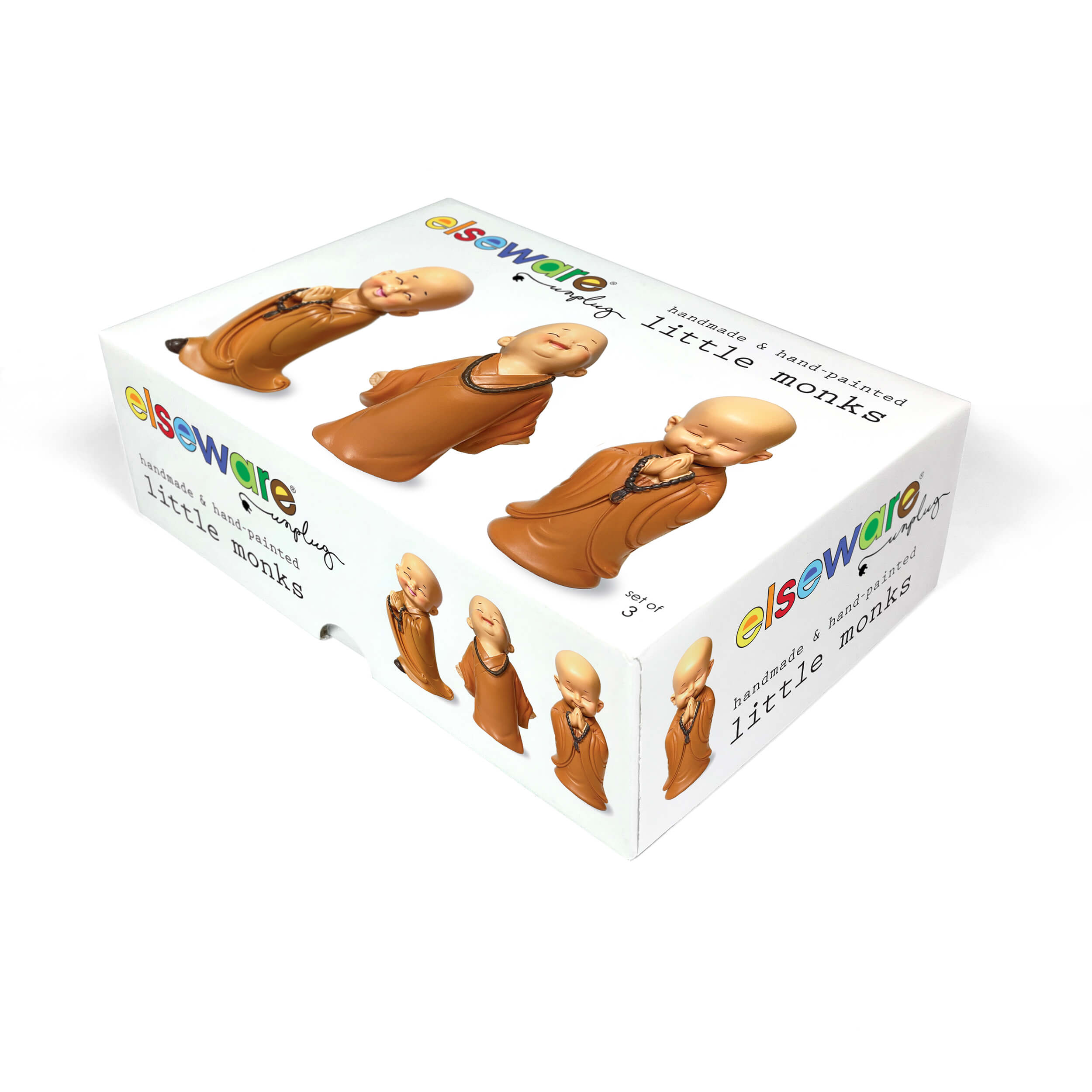 3 Little Monks figurines positioned outdoors showing weather-resistant polyresin material