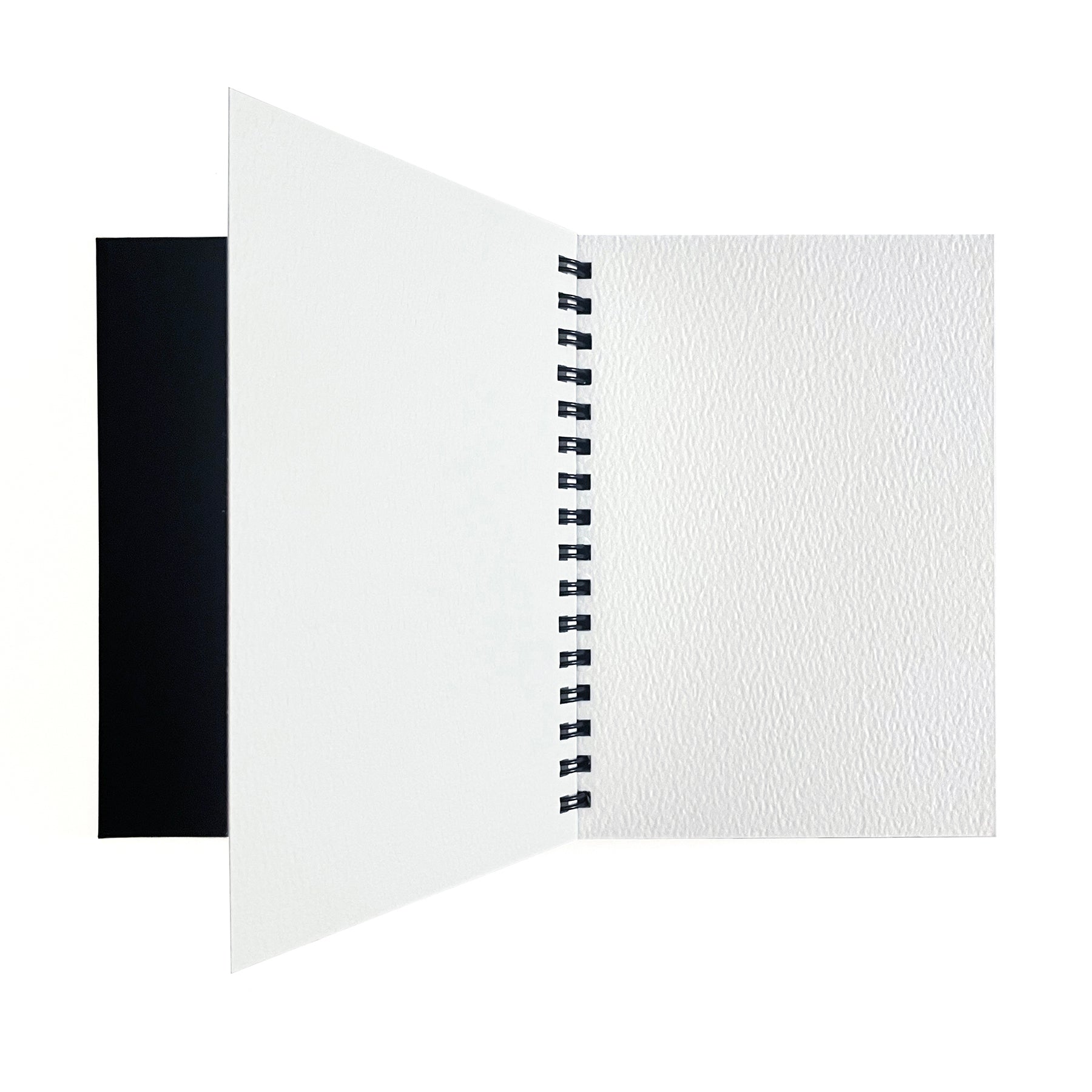 Small watercolor paper pad by elseware unplug displayed open, showing thick cotton rag pages