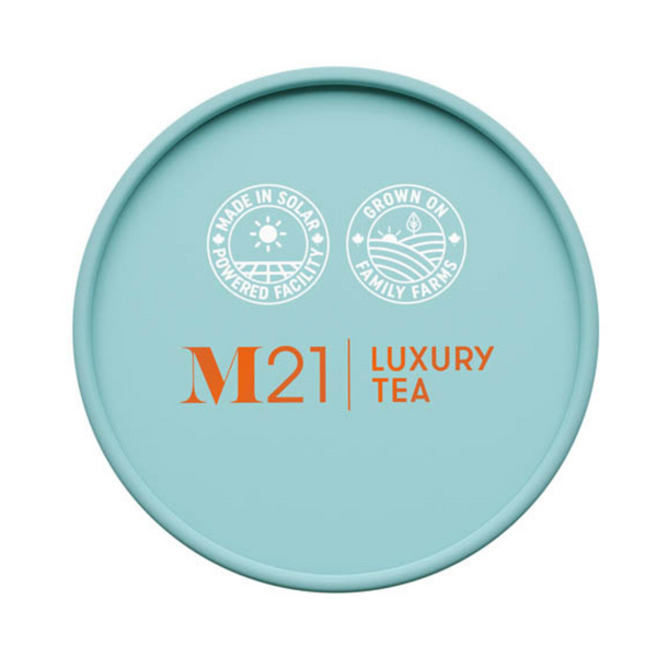 M21 Luxury Tea container lid with branding and certification logos on a light blue background