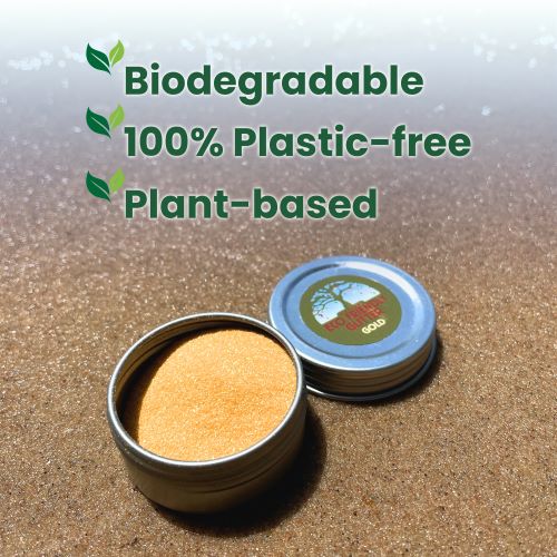 Biodegradable, plastic-free, plant-based product in a container on sand with text overlay.