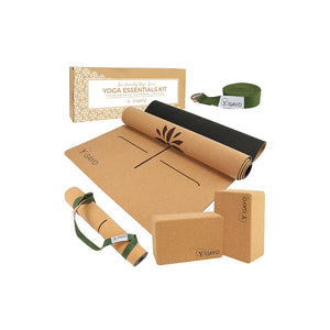 Gayo cork yoga essentials kit with mat, two blocks, stretch strap, and branded box on a white background