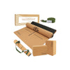 Yoga essentials kit with yoga mat, block, strap, and box on a white background