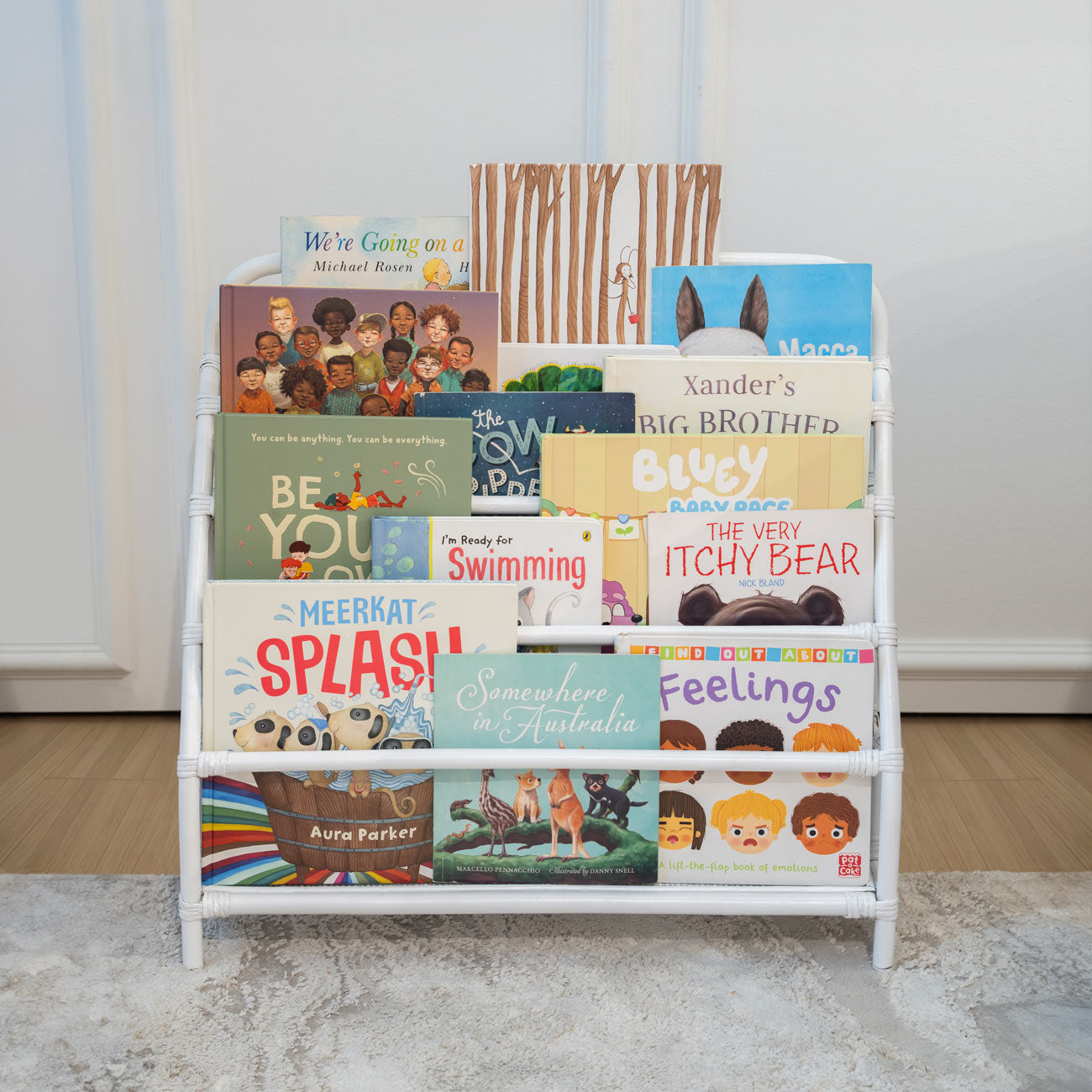 Elena Kids White Rattan Montessori Bookshelf front view showing front-facing book display