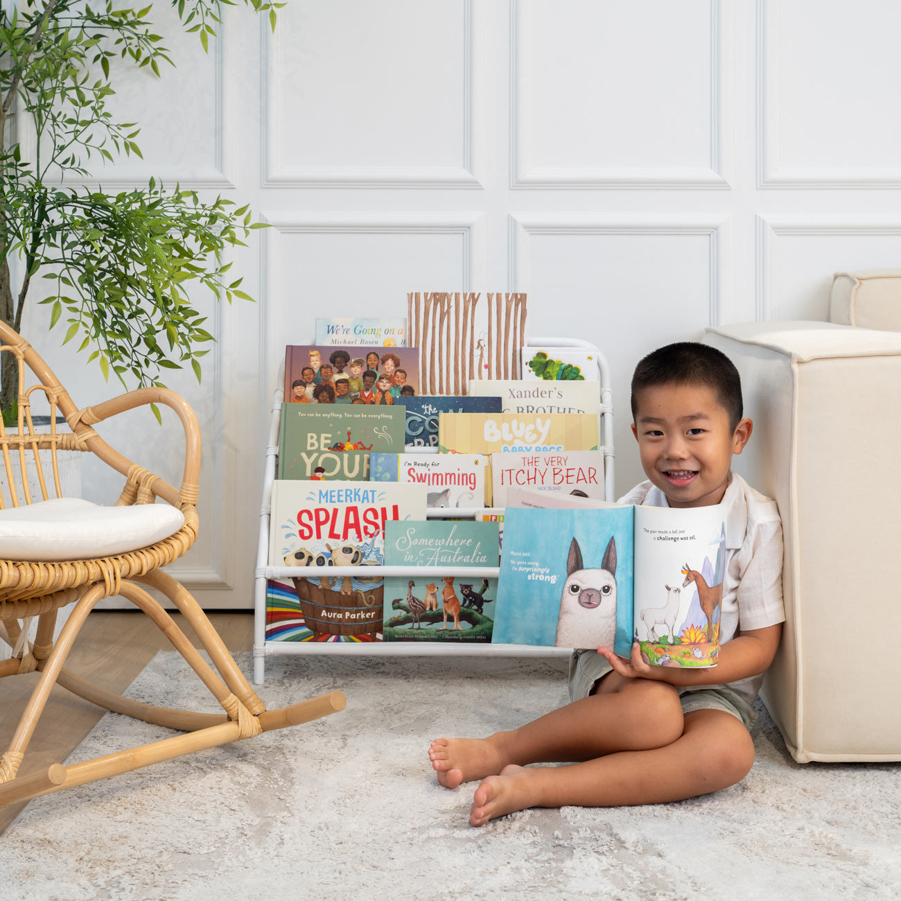 Elena Kids White Rattan Montessori Bookshelf displayed in a bright, modern kids room