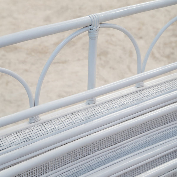 Close-up of the Elena Kids White Montessori Bookshelf showing rattan detail and white finish