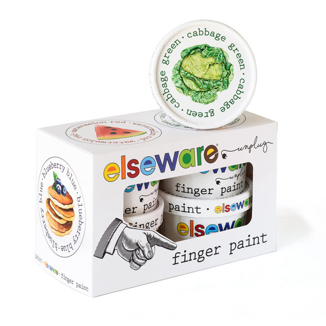 Box of Elsewhere finger paint with a green paint container on top