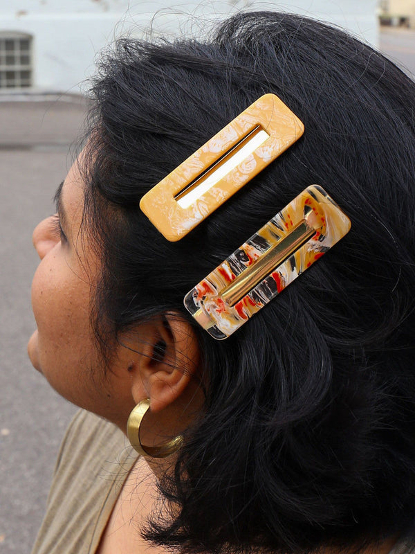 Fair Anita resin hair accessories styled in hair, ethically handcrafted in India