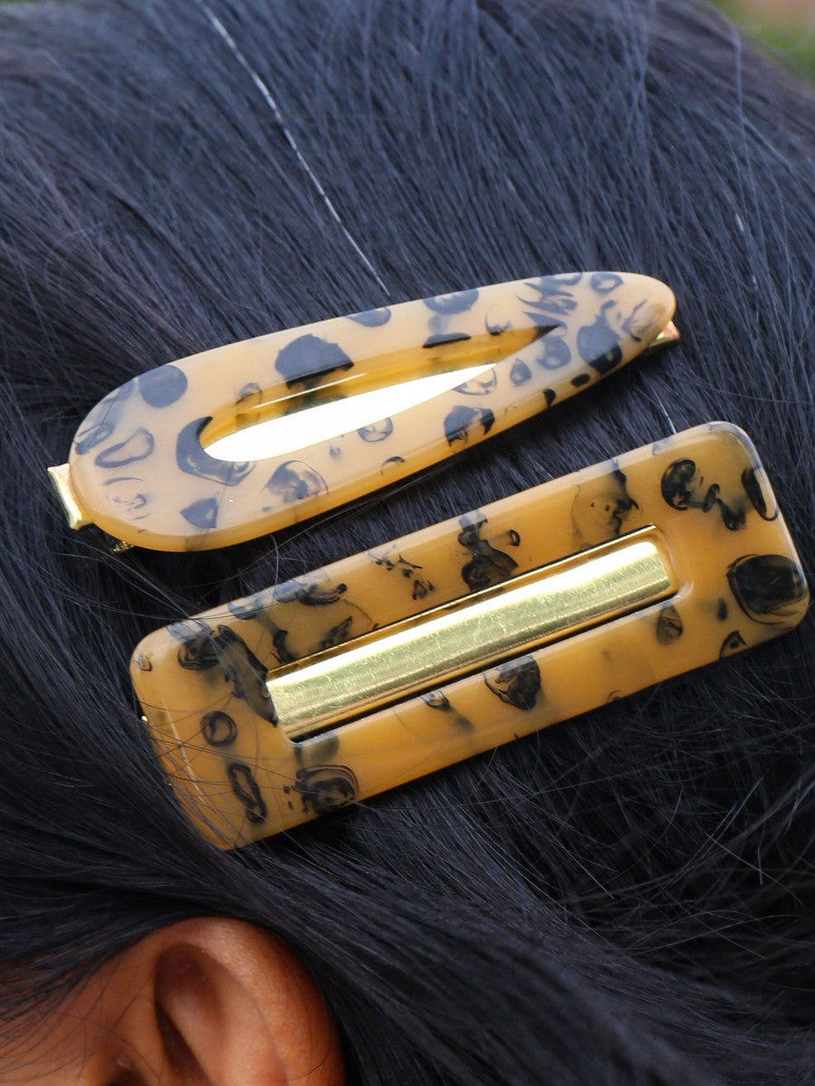 Close-up of ethically made resin hair accessories by Fair Anita
