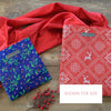 EverBag medium reusable Christmas gift bag folded flat showing compact, storable design