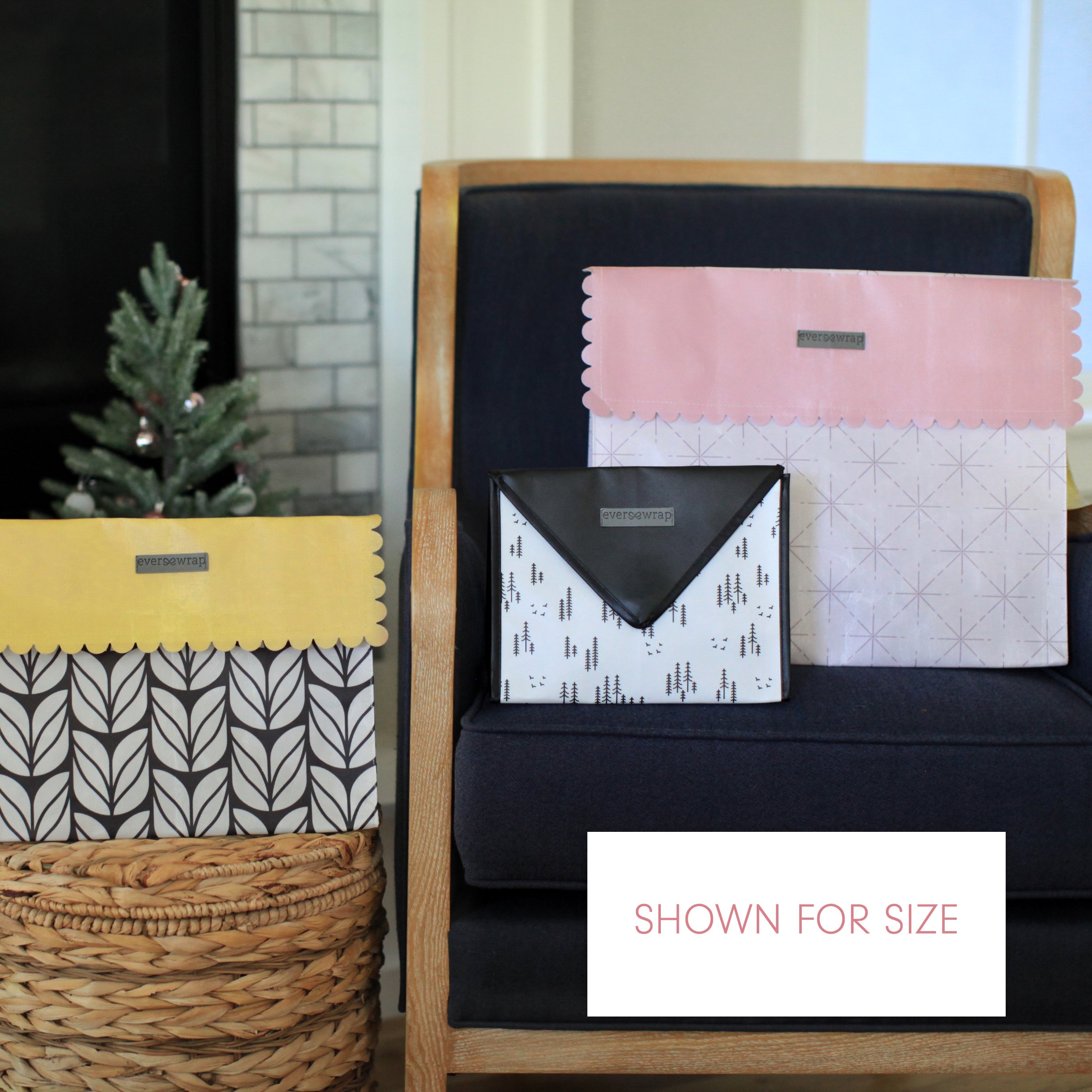 Stack of patterned folders on a shelf with decorative items in the background