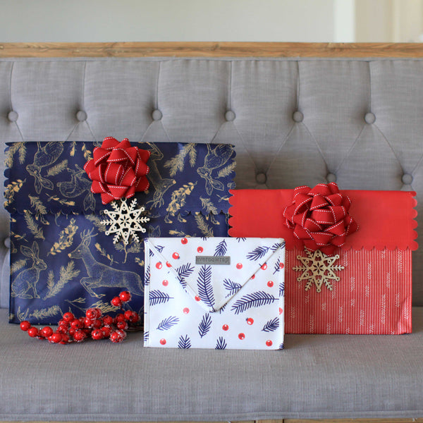 EverWrap sustainable reusable gift wrap set featuring wooden snowflake charm and EverBow