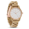 Wooden watch with rose gold accents on a white background