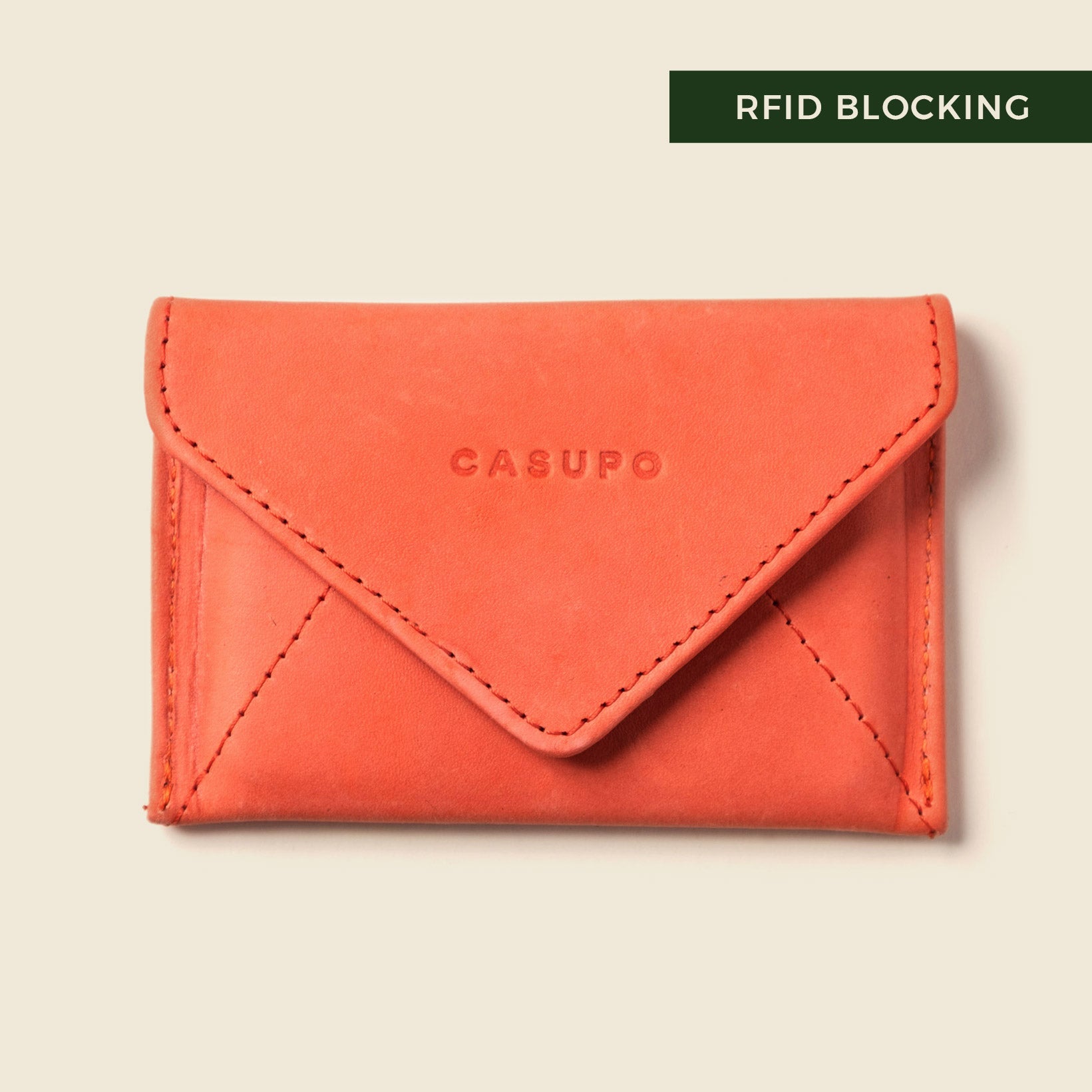 Shop the Mini Envelope Wallet in Pink—compact, RFID-blocking, and made with repurposed full grain leather. Handmade in California with sustainable elegance.

