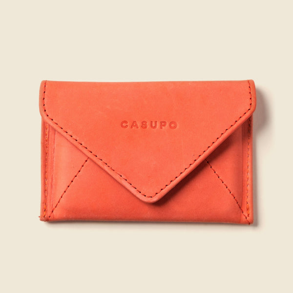 Shop the Mini Envelope Wallet in Pink—compact, RFID-blocking, and made with repurposed full grain leather. Handmade in California with sustainable elegance.

