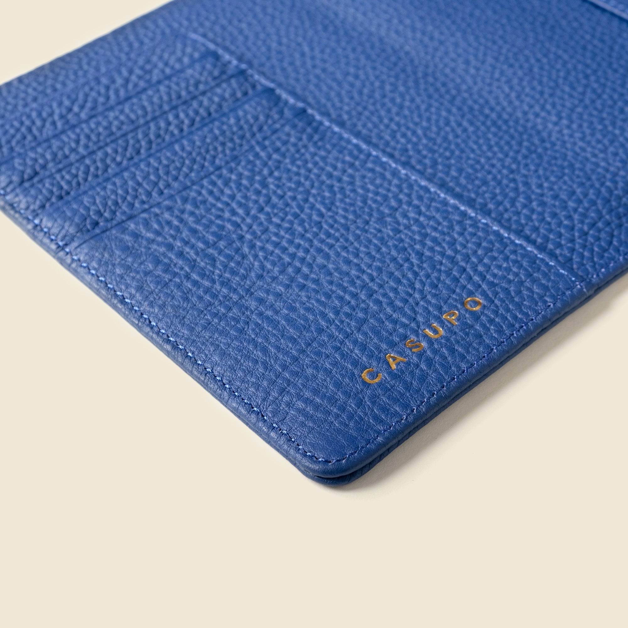 Shop the Leather Passport Wallet with RFID Shield in cobalt blue. Full grain leather, handcrafted design, and RFID protection make this travel wallet secure and stylish.