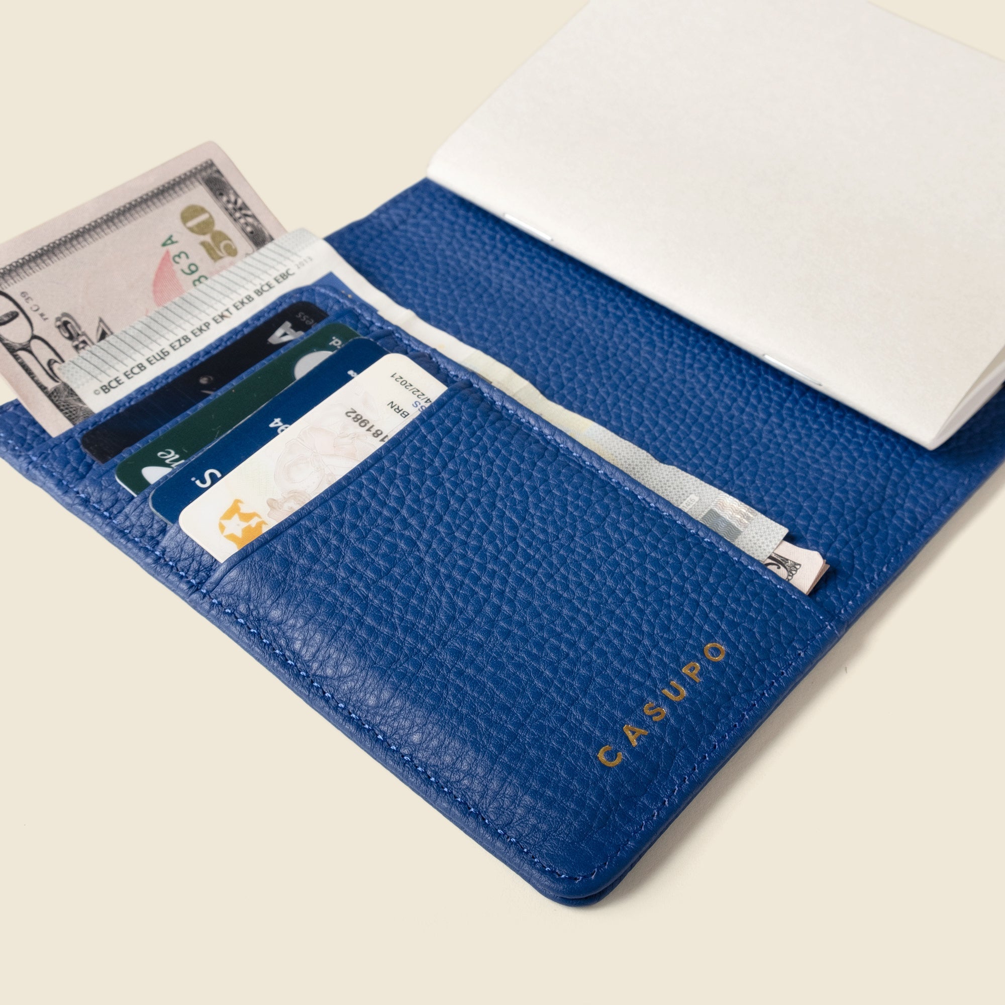 Shop the Leather Passport Wallet with RFID Shield in cobalt blue. Full grain leather, handcrafted design, and RFID protection make this travel wallet secure and stylish.