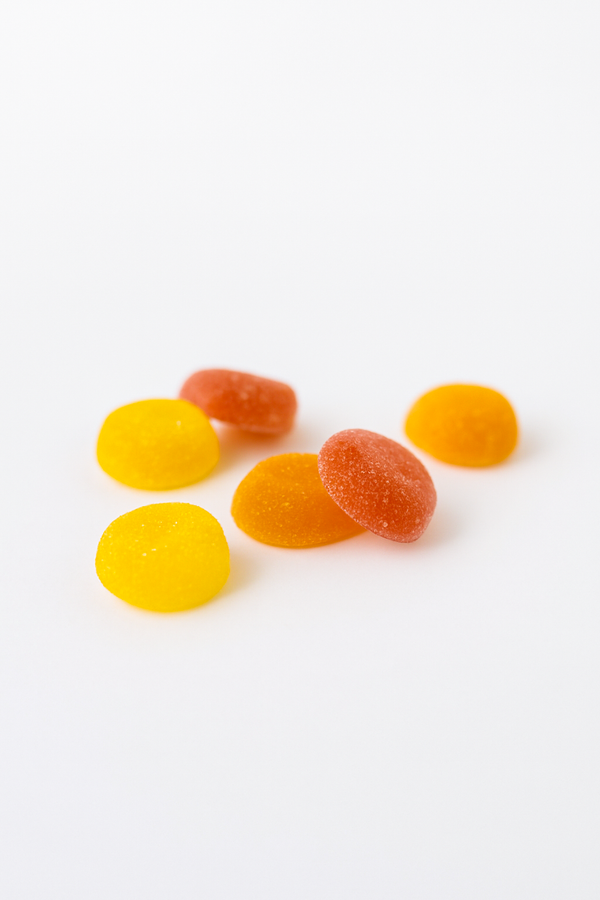 Colorful gummy candies on a white background