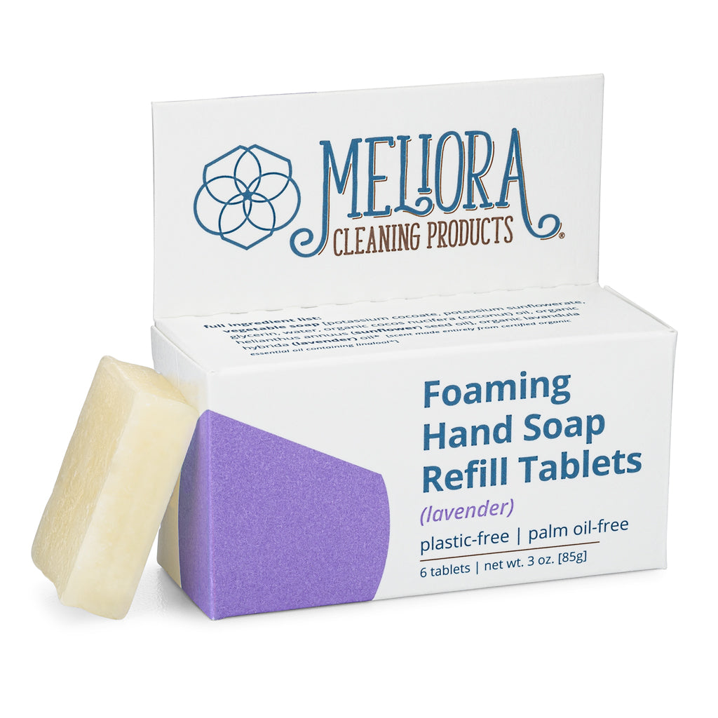 Meliora lavender scented foaming hand soap refill tablet next to its recyclable paperboard box