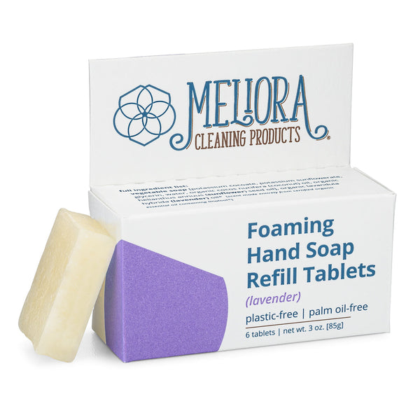Meliora lavender scented foaming hand soap refill tablet next to its recyclable paperboard box