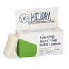 Meliora lemongrass scented foaming hand soap refill tablet next to its recyclable paperboard box