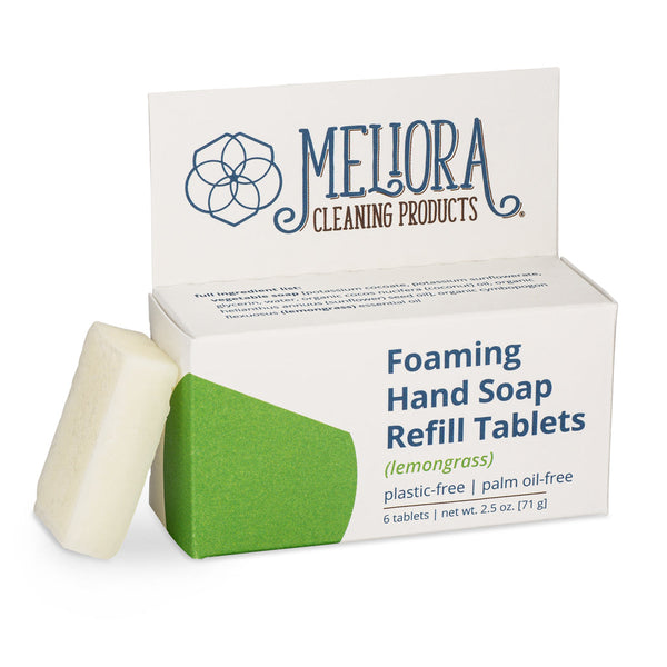 Meliora lemongrass scented foaming hand soap refill tablet next to its recyclable paperboard box