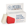 Meliora peppermint scented foaming hand soap refill tablet next to its recyclable paperboard box