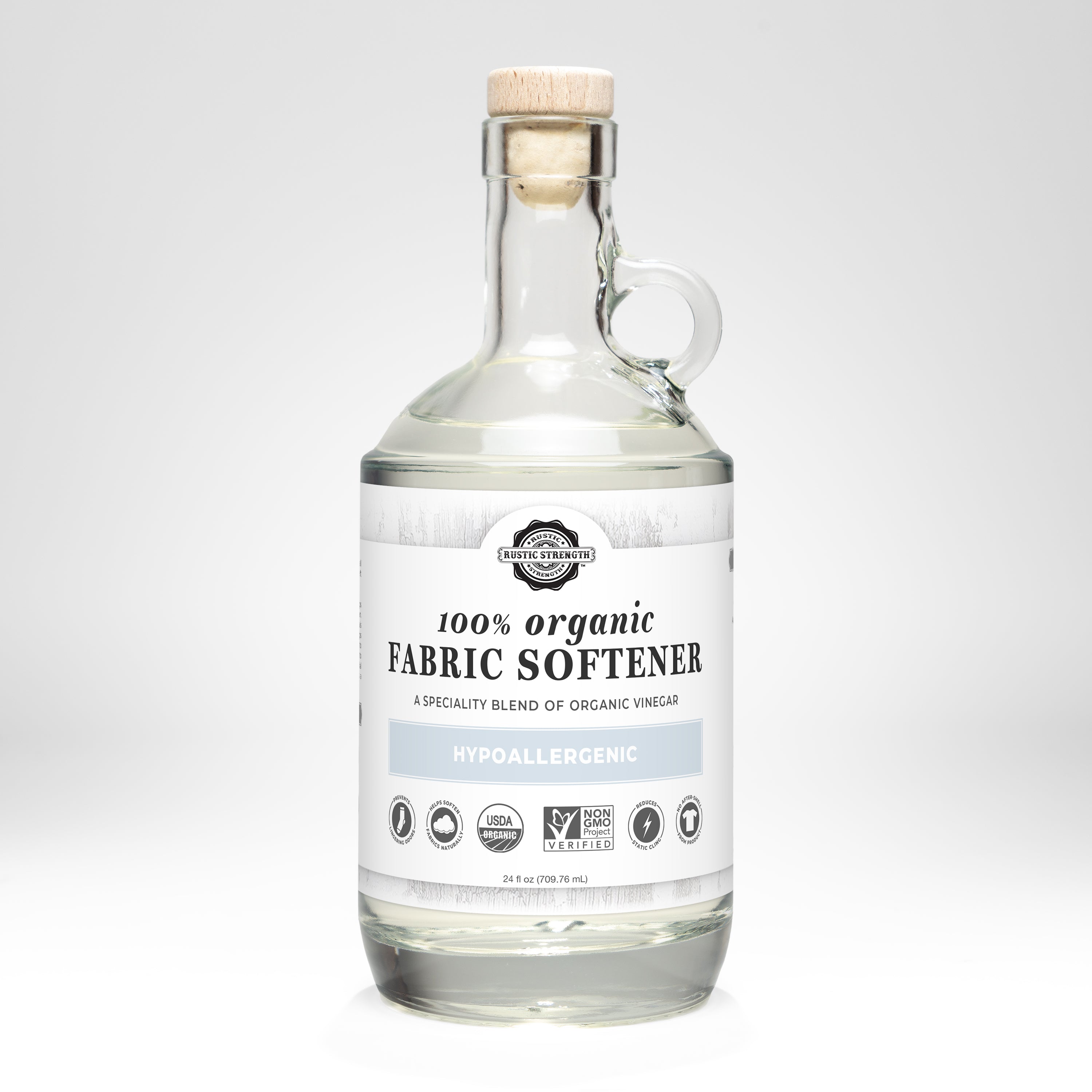 Bottle of 100% organic fabric softener with a label on a white background