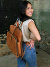 Fair trade leather laptop backpack with adjustable straps, shown from the front – Fair Anita Voyager