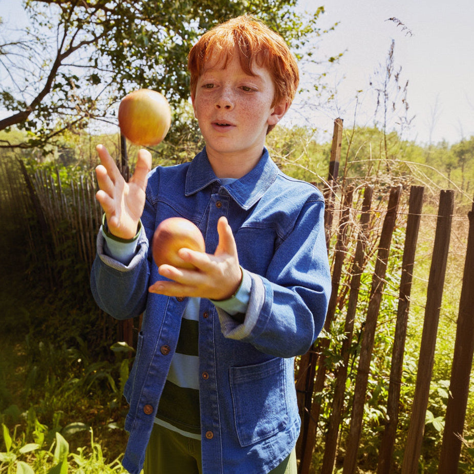 Mon Coeur Kids Denim Barn Jacket worn outdoors, designed to be played in and passed down