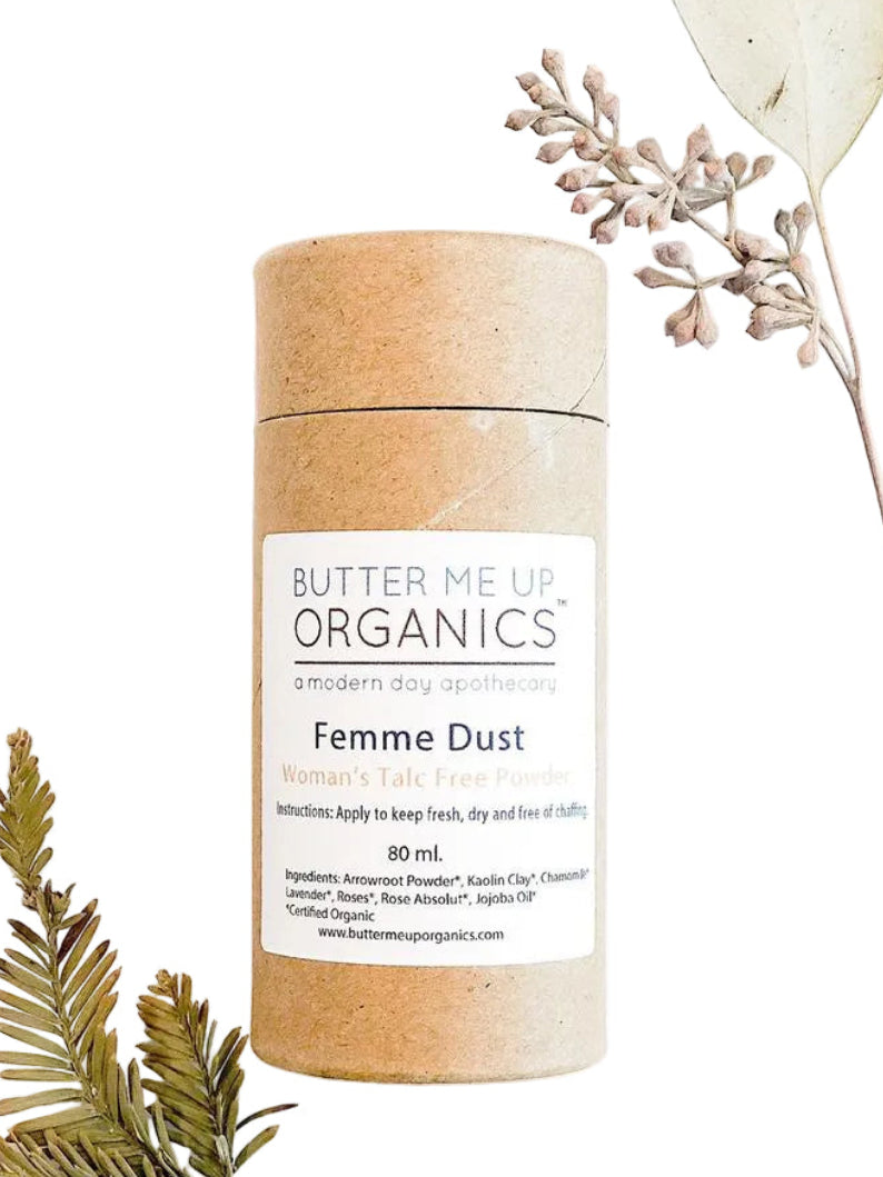 Butter Me Up Organics Femme Dust product on a white background with dried plants.