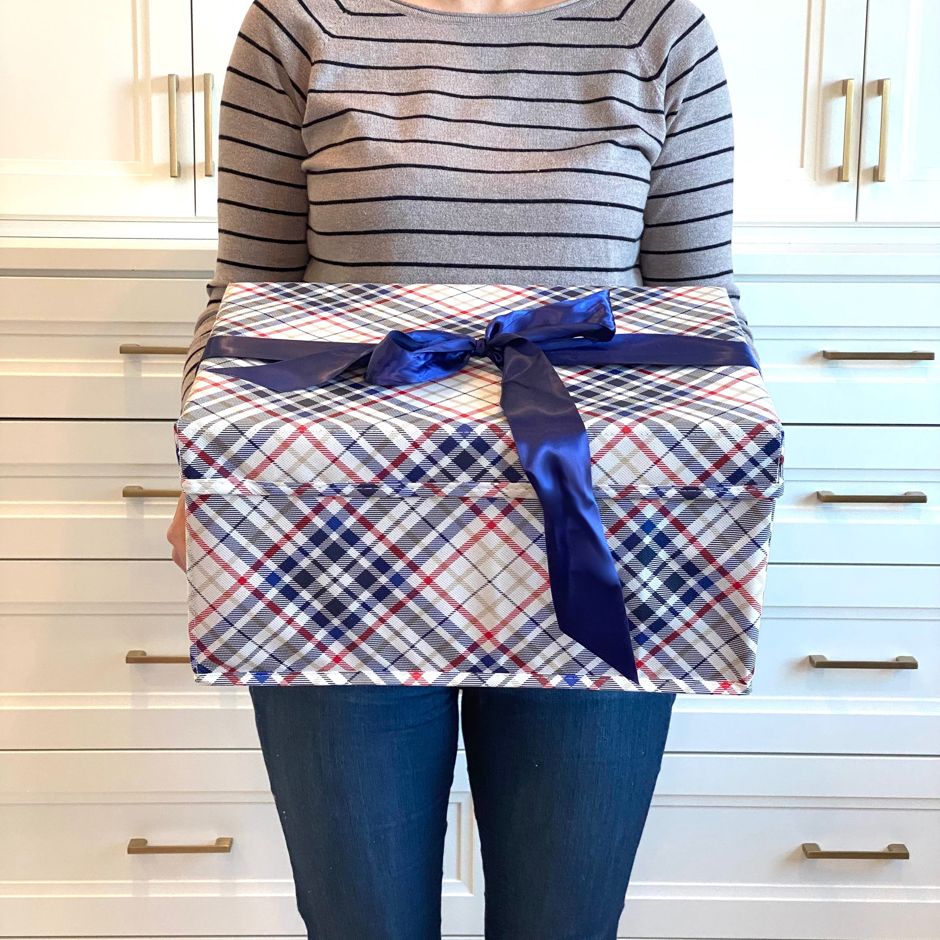 EverBox large foldable gift box in blue plaid shown flat for compact storage