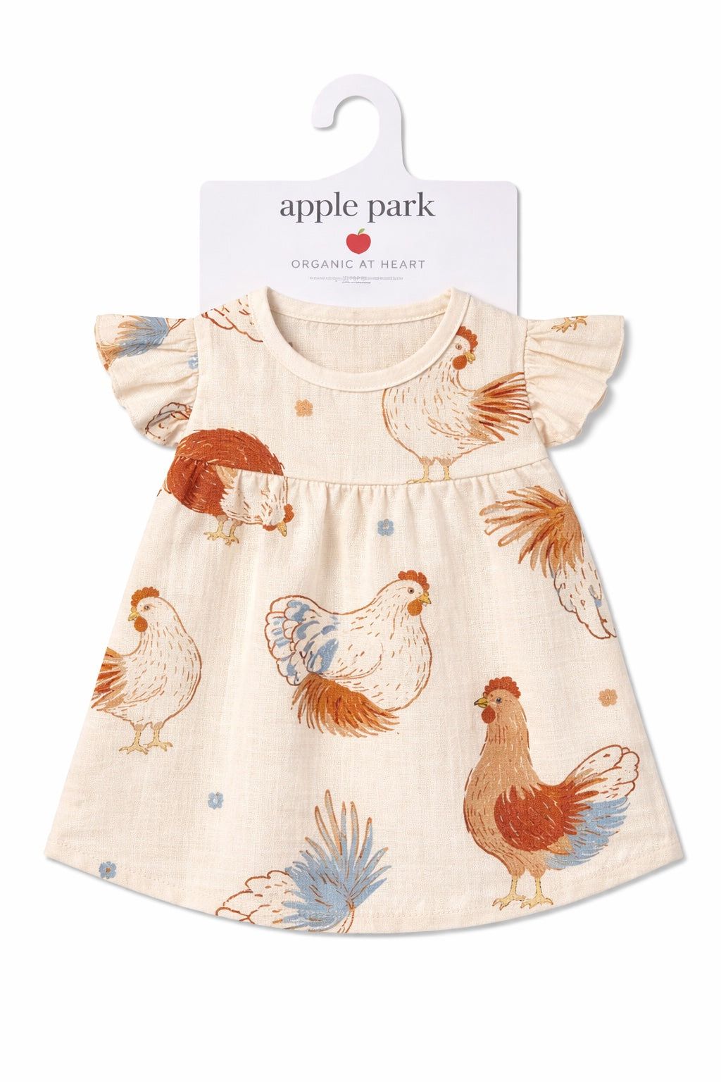 Flat lay of Apple Park Feathered Friends organic cotton muslin doll dress with flutter sleeves and hen print in earthy tones