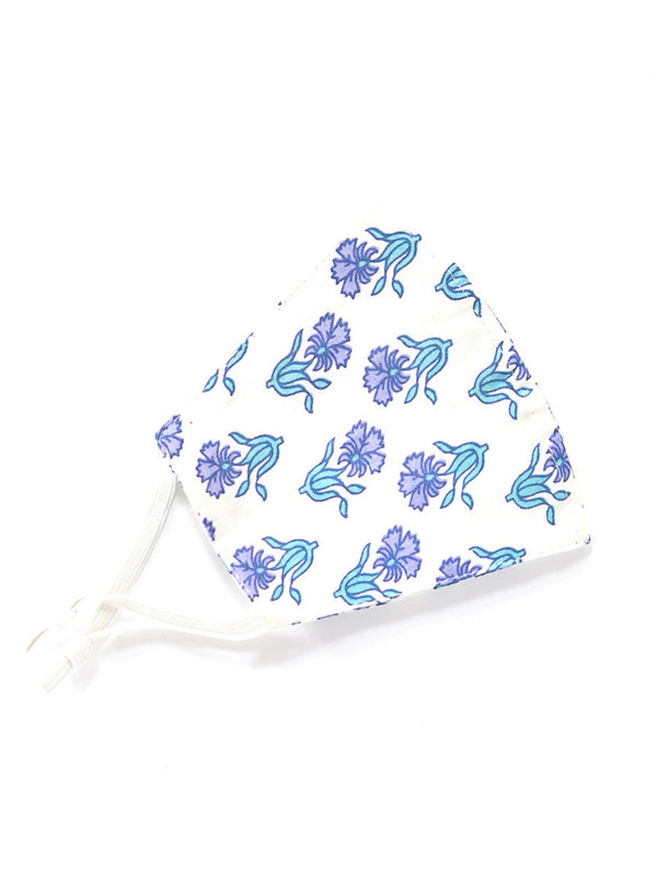 Close-up of fair trade adjustable cotton face masks showing varied patterns and ear loop design