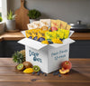 Box of Dory Oats Fruit Faves 12-pack with various fruit on a kitchen counter