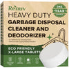 Box of Renuv Heavy Duty Garbage Disposal Cleaner and Deodorizer with a lemon scented tablet on a beige background.
