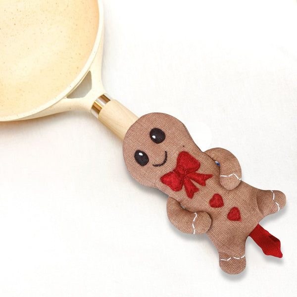 Gingerbread Man Skillet Handle Holder, a handcrafted cotton pot handle cover
