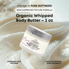 Organic whipped body butter with packaging on a soft, white background