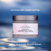 Glimmer Goddess Organic Rosemary Mint Marine Face Mask jar with a blue water background