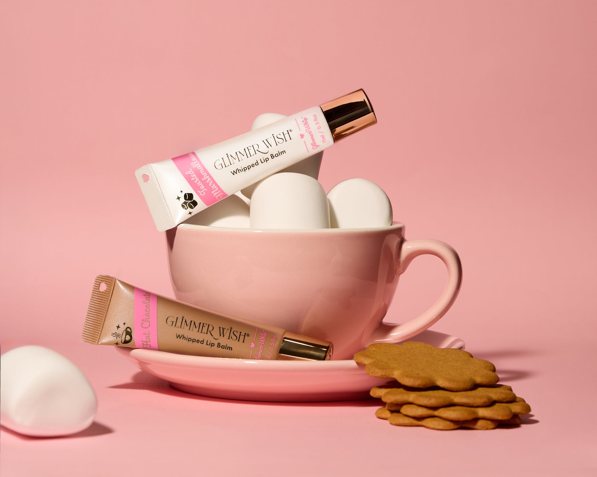 Toasted Marshmallow Glimmer Whip lip balm tube with fluffy poof charm