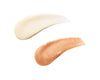 Glimmer Whip lip balm tube with heart cut-out and charm attachment close up