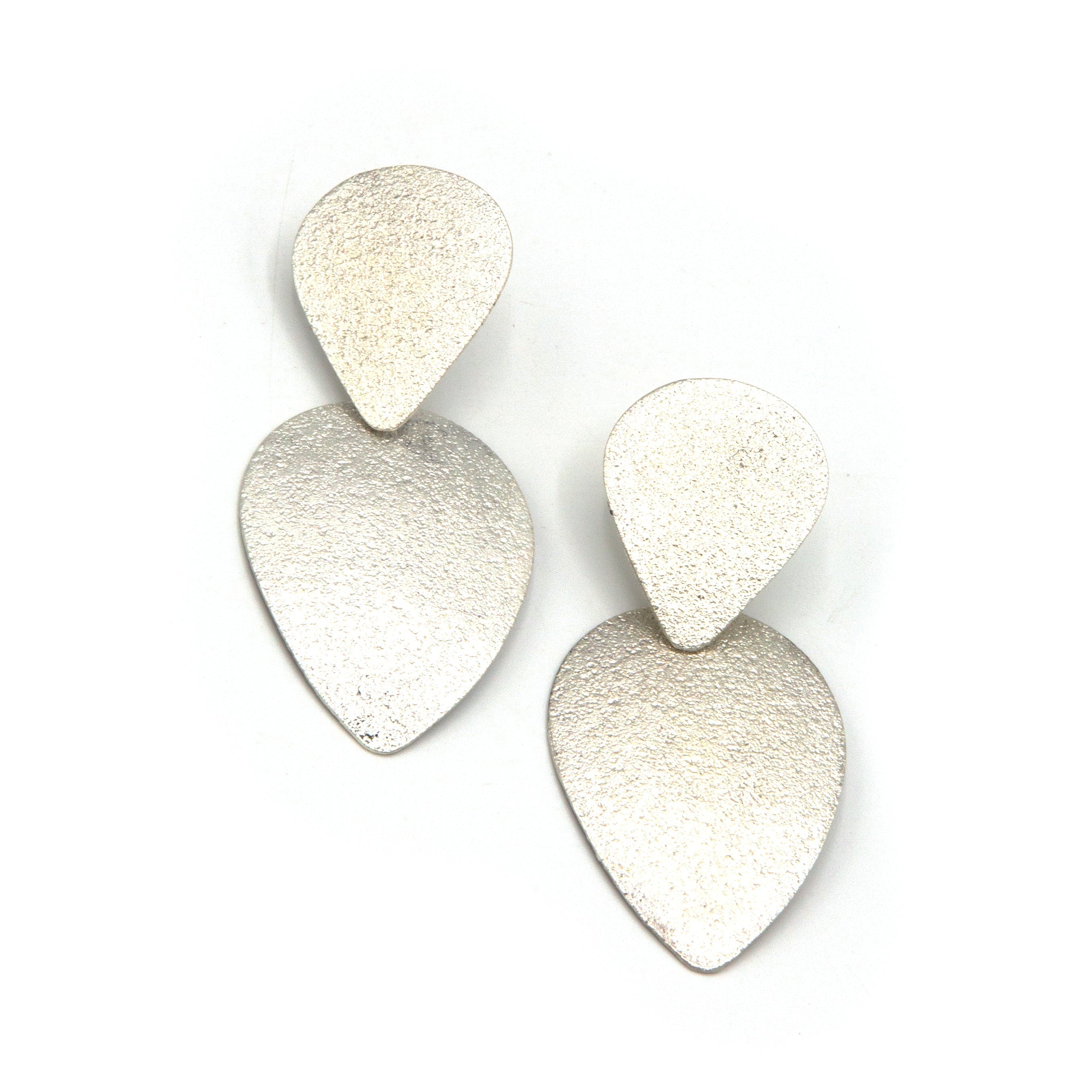 Glitz Teardrop Earrings in silver-plated recycled metal, side profile view showing full drop length