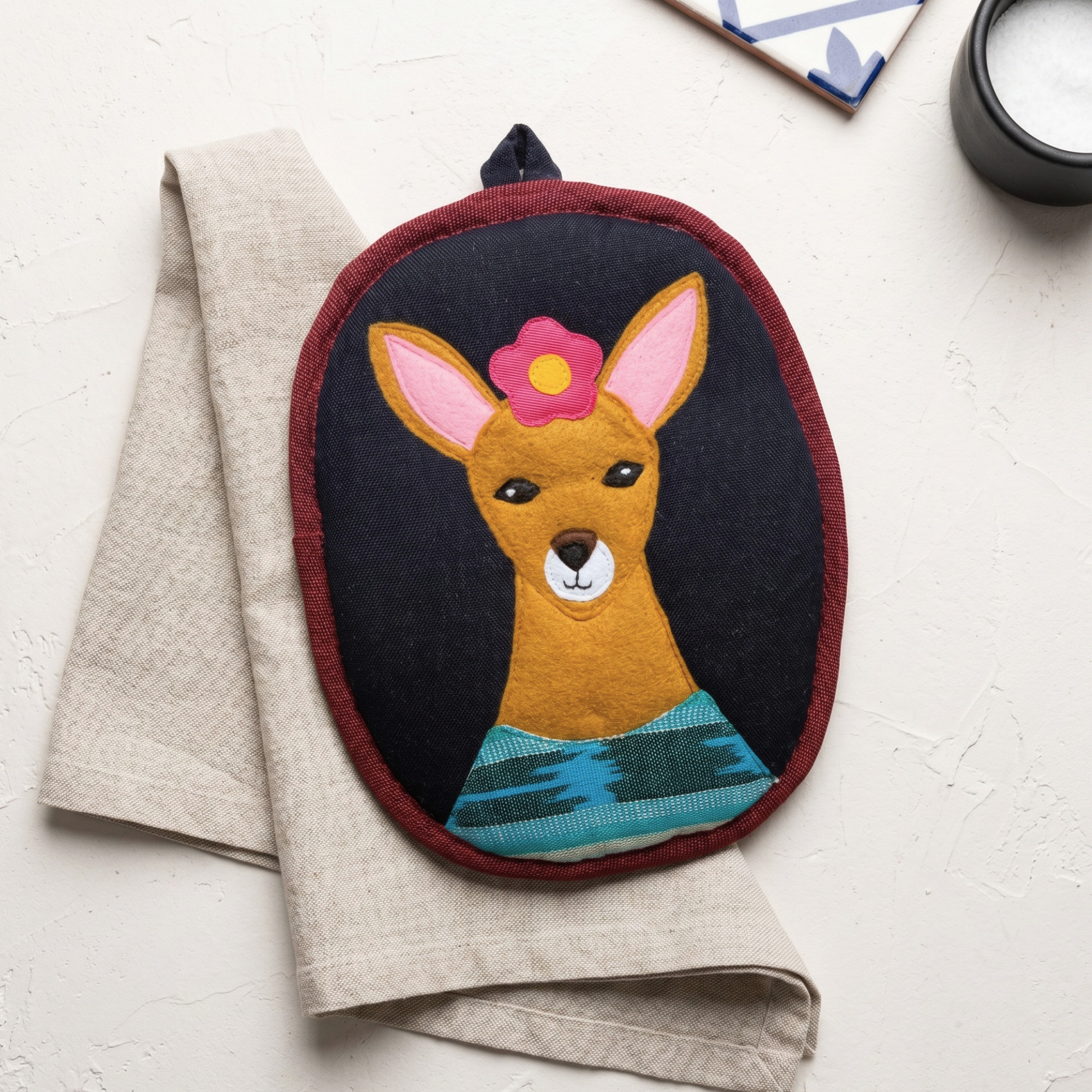 Granizo the Deer Potholder in a kitchen lifestyle setting
