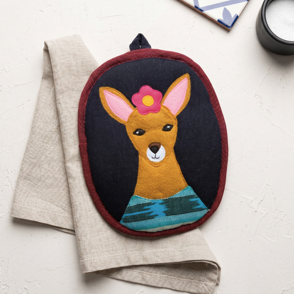 Granizo the Deer Potholder in a kitchen lifestyle setting