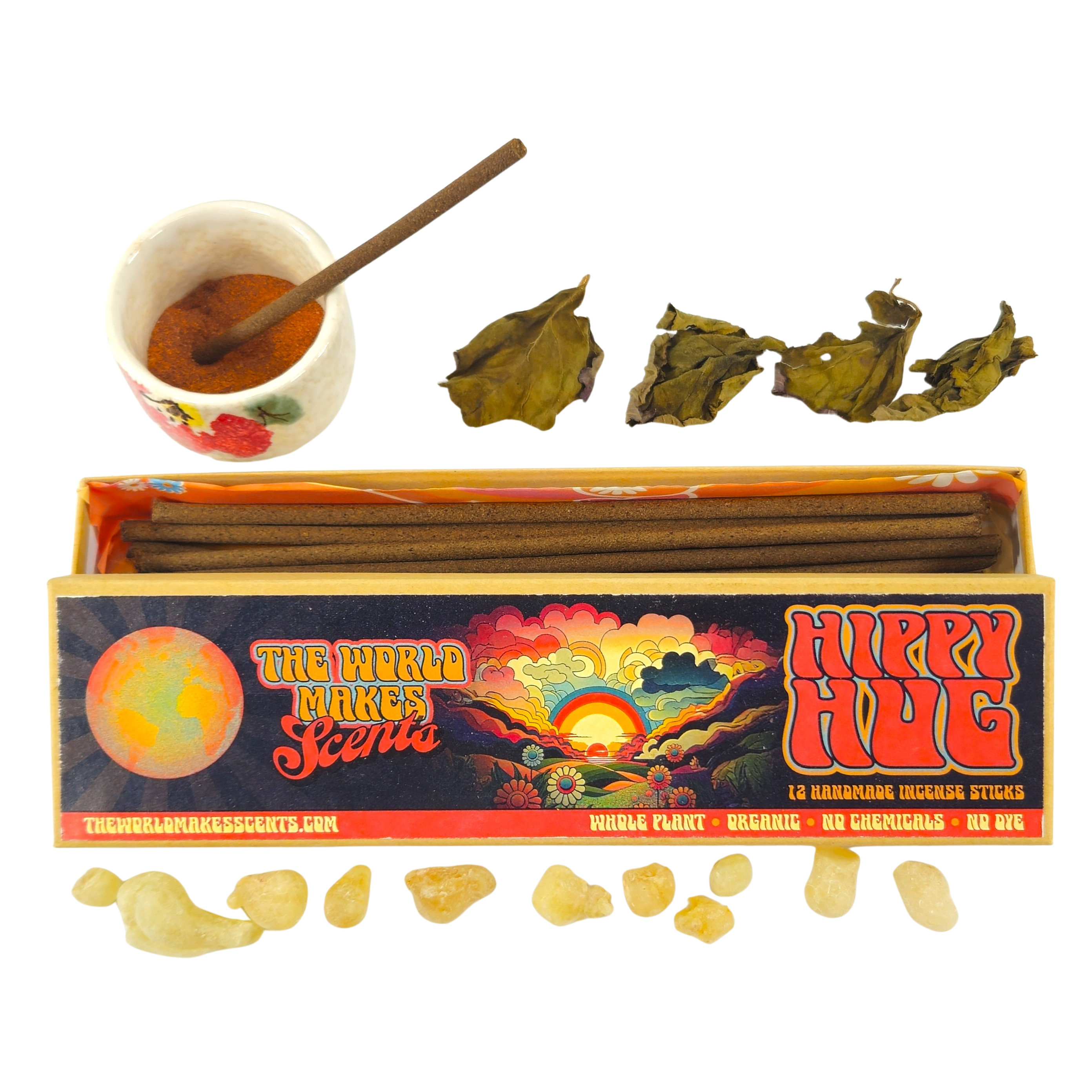 Hippie Hut incense sticks box with incense sticks, leaves, and a cup on a white background
