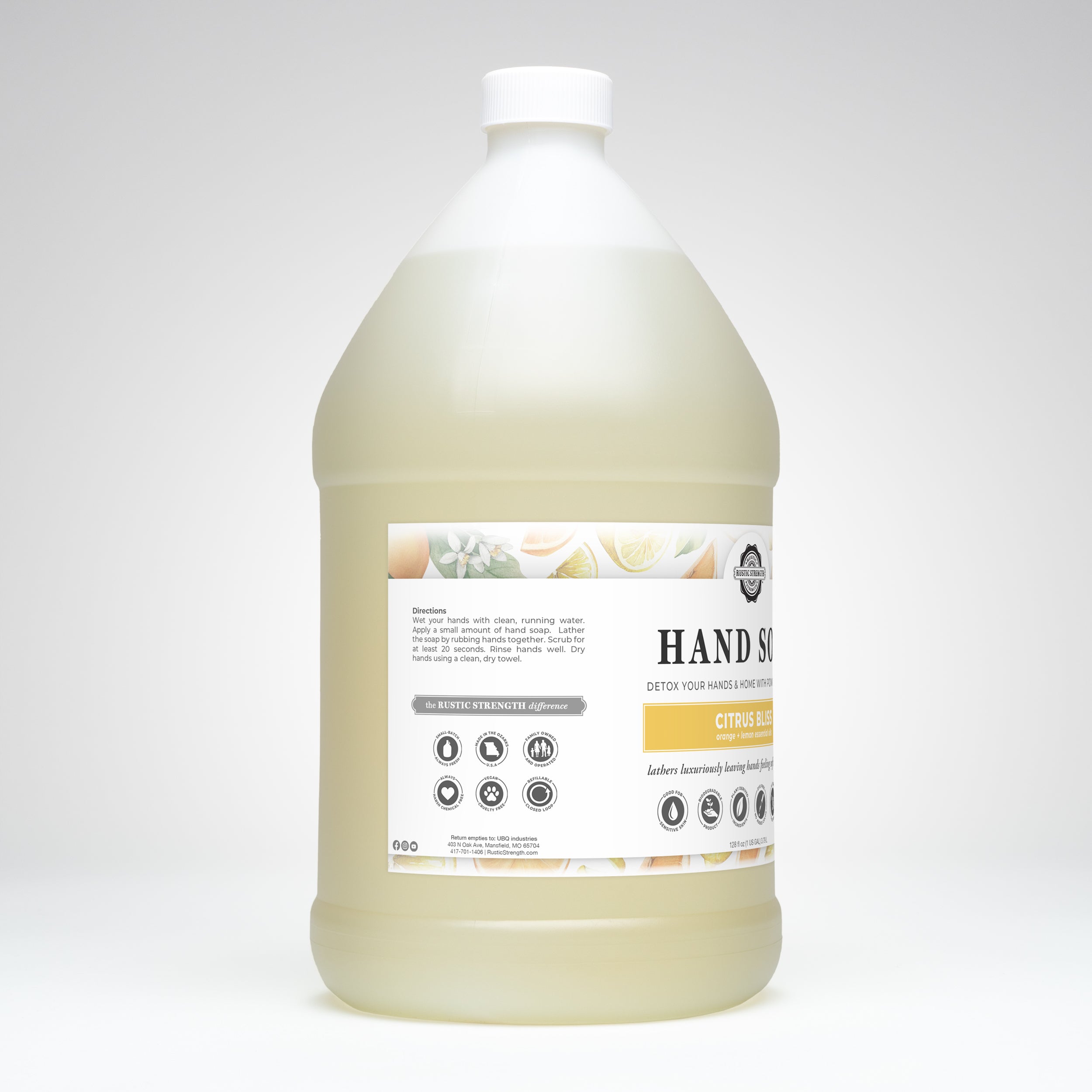 Large bottle of hand soap with a label on a white background