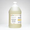 Large bottle of hand soap with a label on a white background