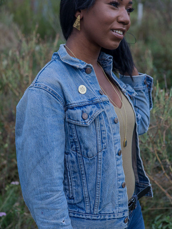 She/her brass pronoun pin – nickel-free, handmade fair trade accessory by Fair Anita