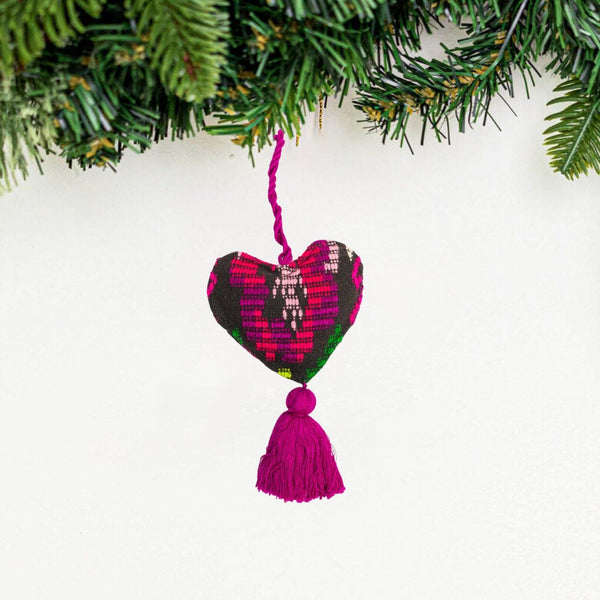 Add a touch of global charm to your home with our handcrafted Guatemalan Heart Ornament. Made from sustainable textiles and featuring a unique design, this ornament is perfect for Valentine's Day or year-round decor. Order yours today!